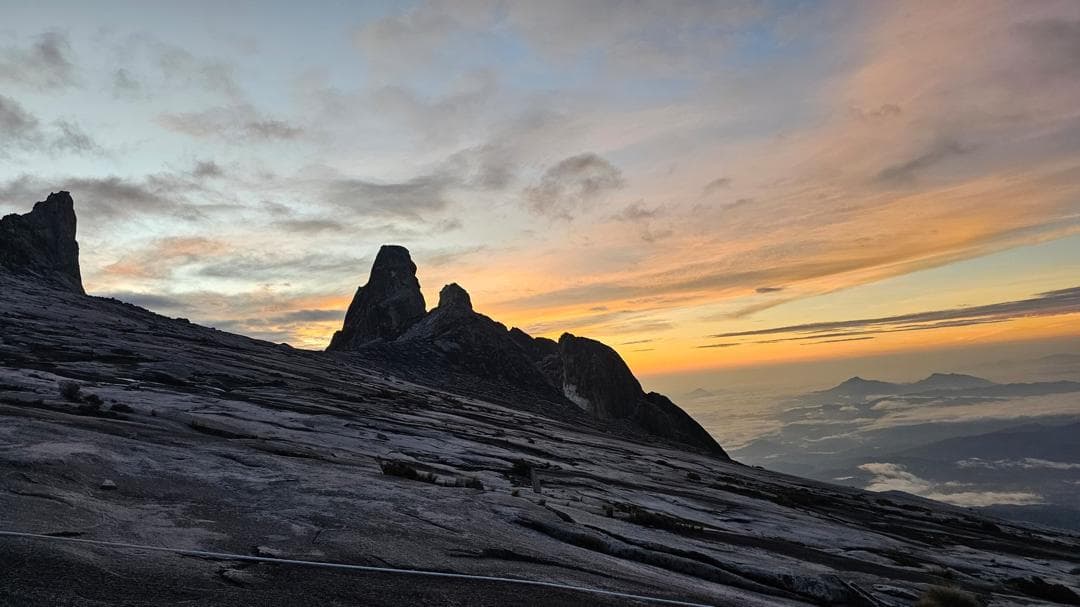 Sunrise over the granite peaks of Mount Kinabalu.